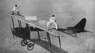 Picture tennis on biplanes.