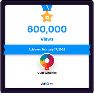A digital certificate shows a gold star with an eye icon, 425,000 VIEWS, and “Achieved July 14th, 2025.” The channel name “Quilt With Kim” appears with the vidIQ logo below.