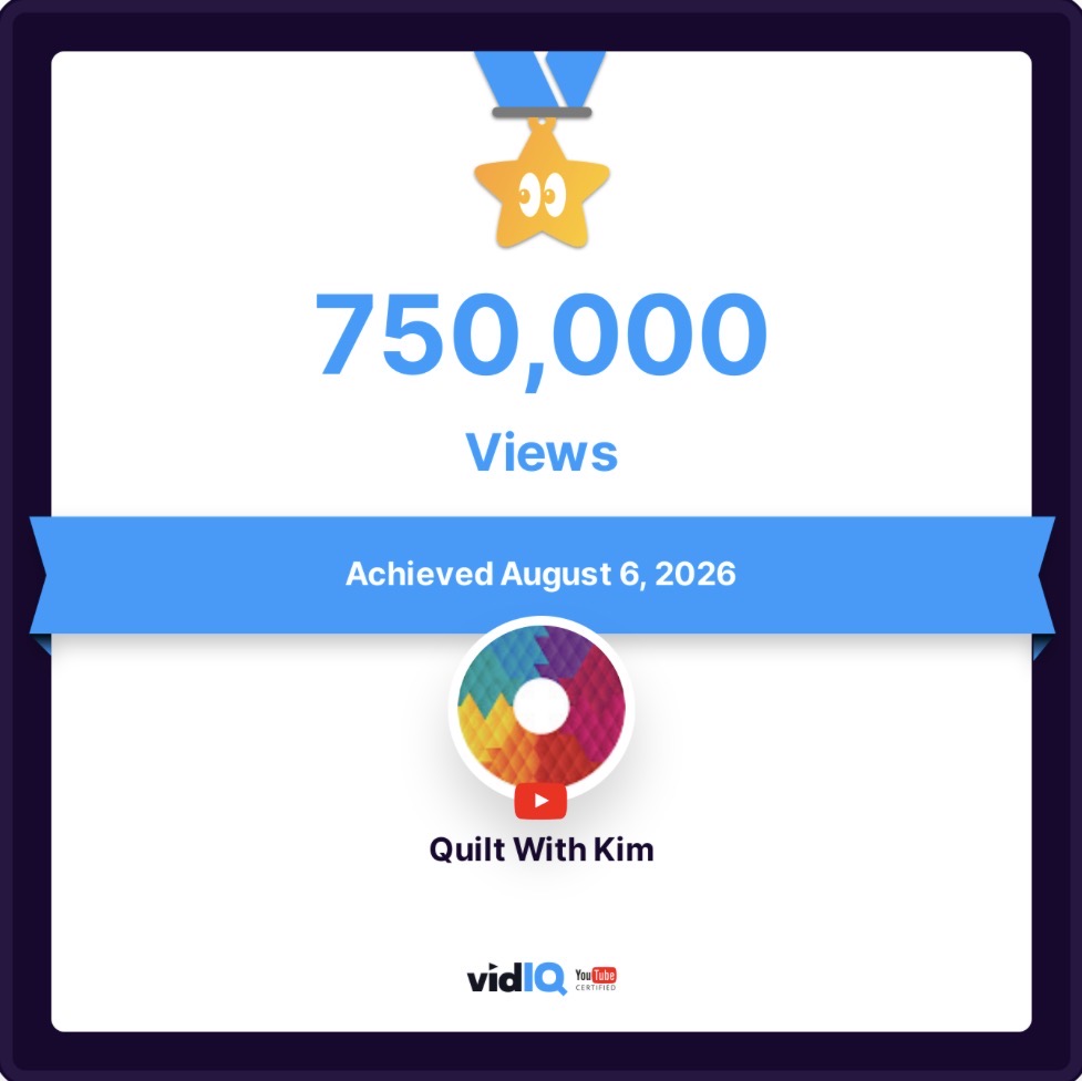 A digital certificate shows a gold star with an eye icon, 650,000 VIEWS, and “Achieved April 6th, 2026.” The channel name “Quilt With Kim” appears with the vidIQ logo below.