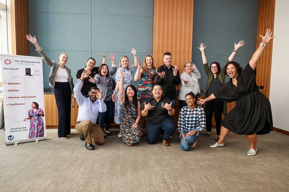 Alena Bennett together with a group of participants of the CFO Boardroom